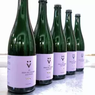Etikettendruckerei: Champagnerflaschen mit Etikett